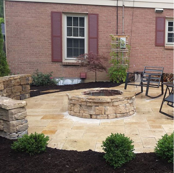 Belvedre Fire Pit and Seat Wall on Noche Travertine Deck